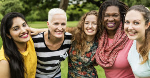 a group of women stand together